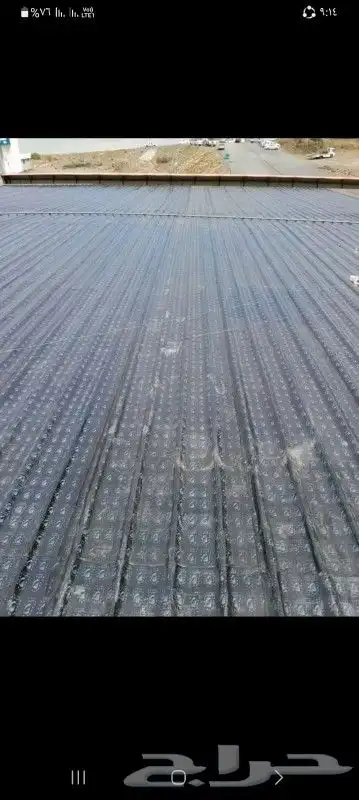 Installing insulation on roofs and hangars and doing asphalt 1